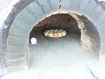 Buns in
        Stone Oven at French Rooms Museam