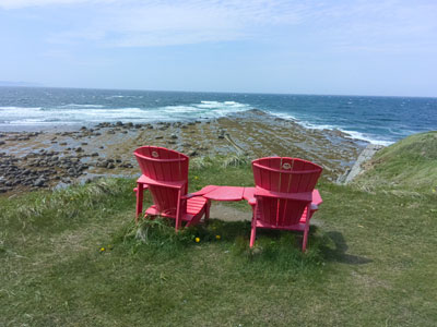 red
              chairs overlooking green point